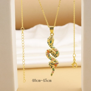 Detailed view of gold snake pendant with colorful zircons and 40cm-45cm chain length
