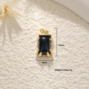Detail of 15x8mm black onyx stone pendant with gold prong setting and size markings