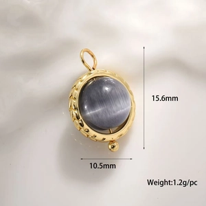 Macro view of a 15.6mm gold-plated copper pendant with grey-purple cat eye stone detail