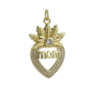Macro detail of gold-plated heart pendant with 'Mom' lettering and crown zircon setting