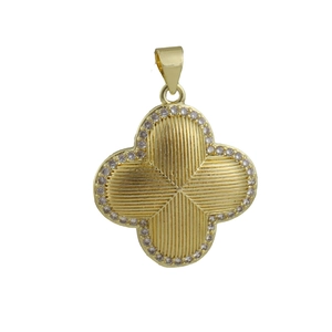 Detailed view of a four-leaf clover pendant with gold radial stripes and zircon borders
