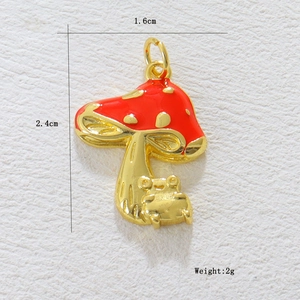 Detalle de dimensiones del colgante de seta de esmalte rojo con pequeña rana dorada