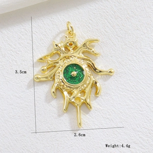 Detail of gold evil eye pendant showing dimensions of 3.5cm by 2.6cm and weights 4.4g