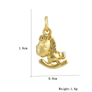 Detailed view of rocking horse pendant with dimensions 1.6cm by 0.9cm and tiny zircons