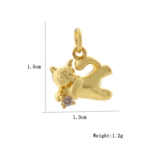 Detailed view of a golden cat pendant with white zircon and size measurements