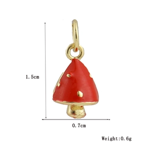 Detalle de un colgante de seta en esmalte rojo de 1,5 cm con dimensiones y peso