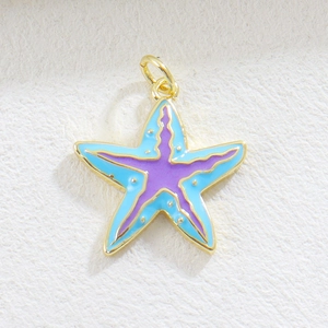Detailed view of starfish charm pendant with light blue and purple enamel and gold plating