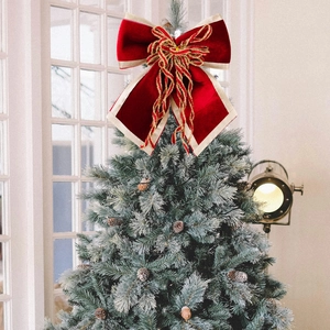 Large red velvet Christmas tree topper bow with elegant gold silk edging and tassels