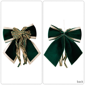 Luxury dark green velvet Christmas bow with gold satin edges and metallic accents