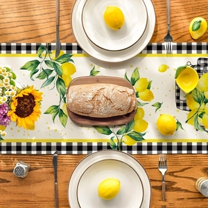 Seasonal lemon and plaid pattern table runner with green leaves on cream fabric
