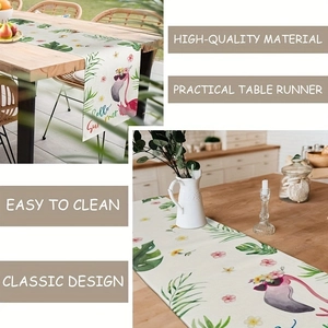 Detail of flamingo table runner with tropical leaves on indoor and outdoor wooden tables