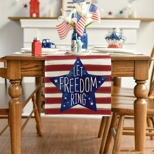 Patriotic table runner with red stripes and blue star featuring Let Freedom Ring slogan