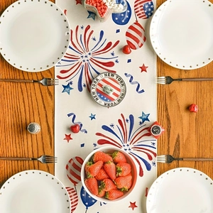 Independence Day table runner with red white and blue fireworks on a rustic wooden table