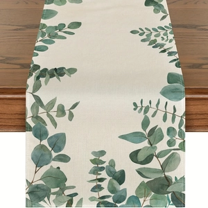 Linen eucalyptus leaf table runner on dark wood surface for home dining decor