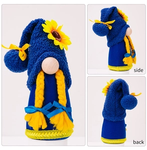 Detailed views of sunflower gnome plush showing front side and back perspectives
