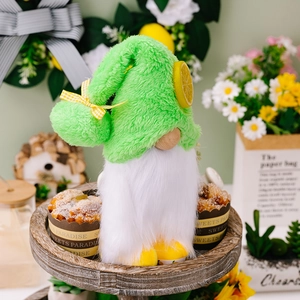 Summer lemon plush gnome doll with green hat and yellow bow on a tiered wooden tray