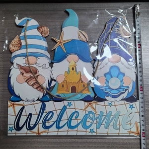 Nautical gnome welcome wooden sign with seashell and starfish beach decorations