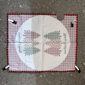 Detail of Christmas mailbox cover with Merry Christmas tree design and red plaid borders