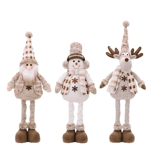 Three Christmas telescopic plush dolls featuring Santa, Snowman and Reindeer in earth tones