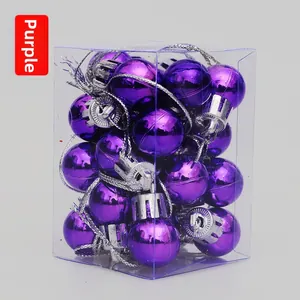 Detail of 2cm purple glossy Christmas ball ornaments in a transparent gift box packaging