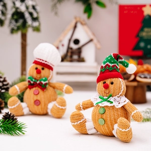 Charming knitted gingerbread man dolls with chef and Santa hats for Christmas decor