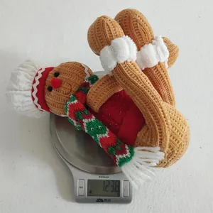 Detailed view of handmade gingerbread man plush toy weighing 123.8g for Christmas decor