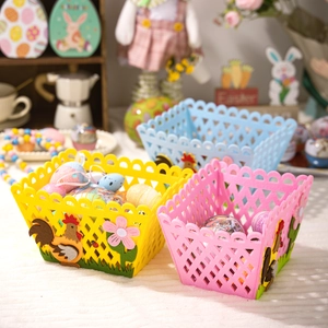 Easter felt rooster baskets in yellow pink and blue colors with decorative eggs