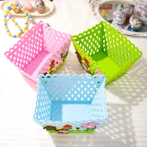 Colorful Easter felt storage baskets with rooster and floral cutouts for candy or decor