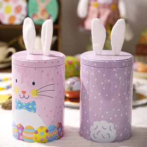 Easter bunny tin boxes with plush ears for candy storage and festive holiday decorations