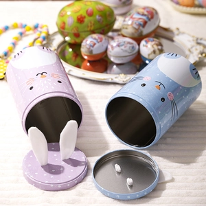 Easter bunny tin cans in pastel blue and purple colors with cute plush rabbit ears