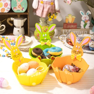 Three felt Easter baskets with bunny ears for candy storage and festive home decoration