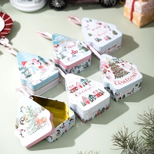 Christmas tree shaped tinplate candy gift boxes with festive snowman and reindeer patterns