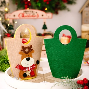 Christmas felt gift bags with reindeer applique and green design for holiday treats