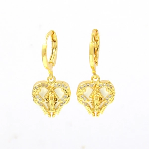 Detailed view of gold-plated heart earrings with Virgin Mary icon and zircon accents