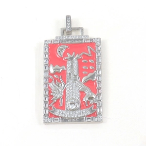 Detail of silver Tarot The Tower pendant with red enamel and sparkling crystal inlay