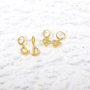 18k gold plated earring set with moon and heart charms featuring religious portraits
