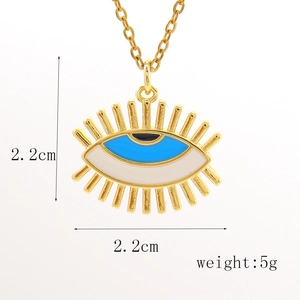 Detail view of 2.2cm golden evil eye pendant with enamel and 5g weight measurement