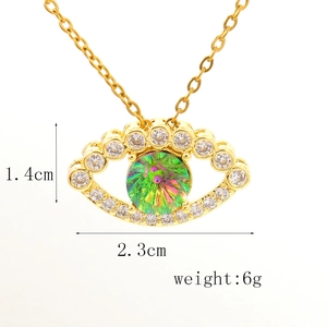 Detail view of gold eye pendant with dimensions 1.4cm height and 2.3cm width