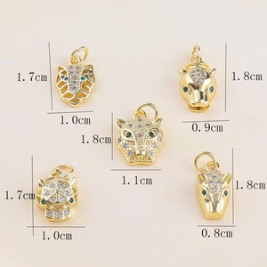 Detailed size view of five 18k gold plated leopard head charms with micro-pave zircons