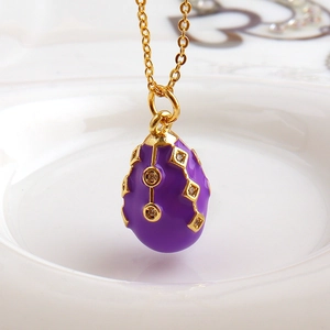 Vintage 18k gold plated purple enamel egg pendant necklace with sparkling diamonds