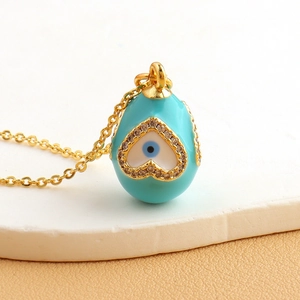 Gold-plated evil eye heart necklace with turquoise enamel and sparkling cubic zirconia