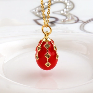 Exquisite 18k gold plated necklace with red enamel egg pendant and crystal inlay