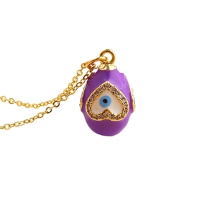 Gold-plated necklace with purple heart-shaped evil eye pendant and zircon crystals