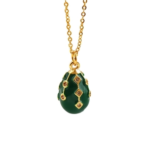 Gold plated egg pendant necklace with green enamel and sparkling crystal accents