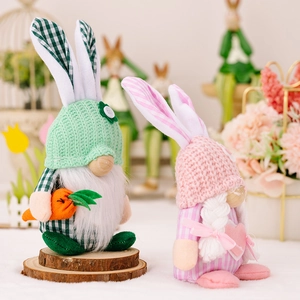 Easter gnome plush dolls set with rabbit ears and carrots on a wooden base