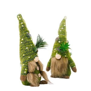 Set of two green knitted gnome plush toys with succulent plant accents on pointed hats
