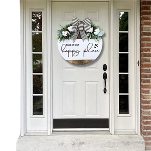 Round wooden welcome sign with eucalyptus and stripes for rustic home door decor