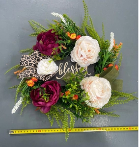Detail view of autumn wreath with peonies and blessed sign showing 42cm measurement