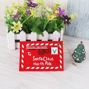 Red felt Christmas envelope ornament for tree decoration and holiday gift card holder