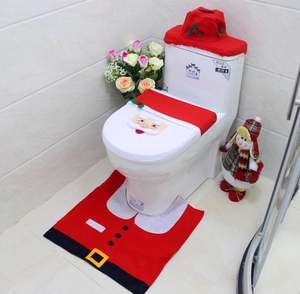 Three-piece Santa Claus bathroom set featuring embroidered lid cover and plush floor mat